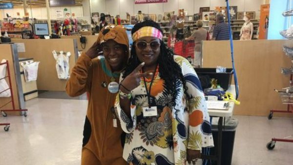 Two women in a hippie costume