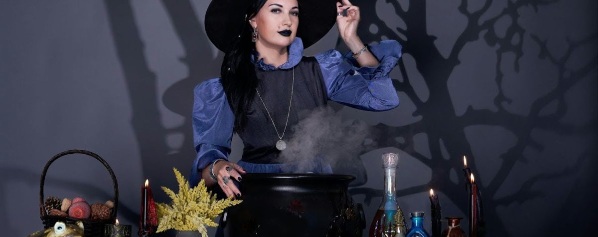 A woman getting her witch on.